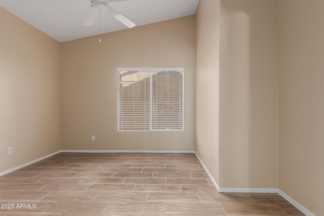 spare room with lofted ceiling, ceiling fan, and light hardwood / wood-style floors