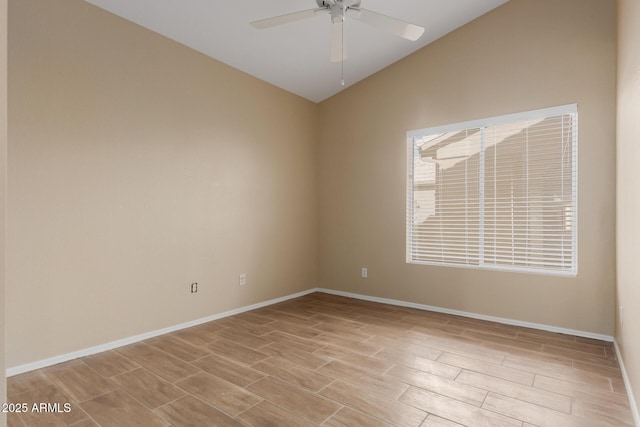 unfurnished room featuring lofted ceiling, ceiling fan, and light hardwood / wood-style floors