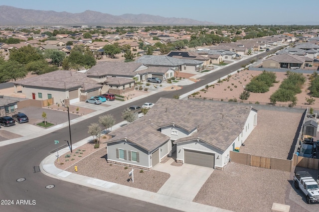 birds eye view of property featuring a mountain view