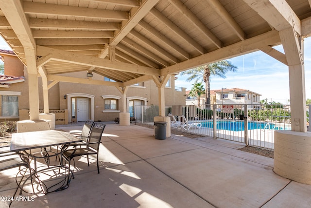 view of patio / terrace featuring a community pool