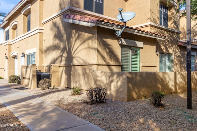 view of property exterior featuring cooling unit