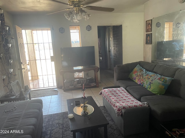 living room with light tile patterned flooring and ceiling fan