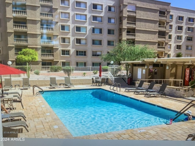 view of pool with a patio area