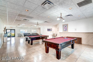 playroom featuring a paneled ceiling, tile patterned floors, and billiards