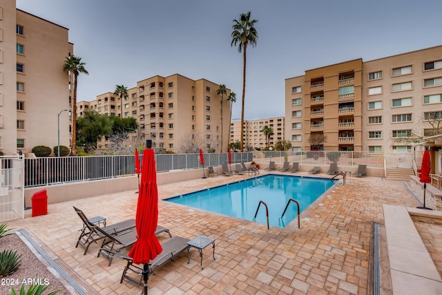 view of swimming pool featuring a patio