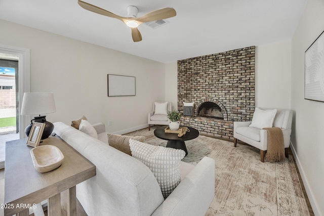 3614 W Danbury Dr, Glendale, AZ 85308 - living area featuring a ceiling fan and a fireplace