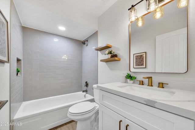 3614 W Danbury Dr, Glendale, AZ 85308 - full bathroom with vanity, shower / washtub combination, wood finished floors, and recessed lighting