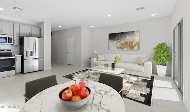 living room featuring light tile patterned floors