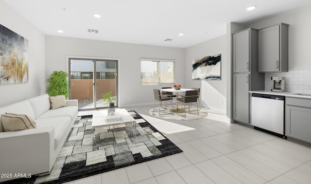 living room with light tile patterned floors