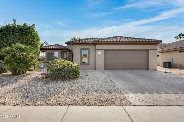 15303 W Paradiso Ct, Surprise, AZ 85374 - view of front facade featuring central AC unit and a garage