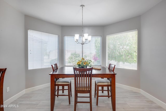 dining room with a chandelier