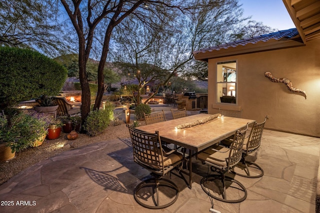 view of patio featuring outdoor dining area