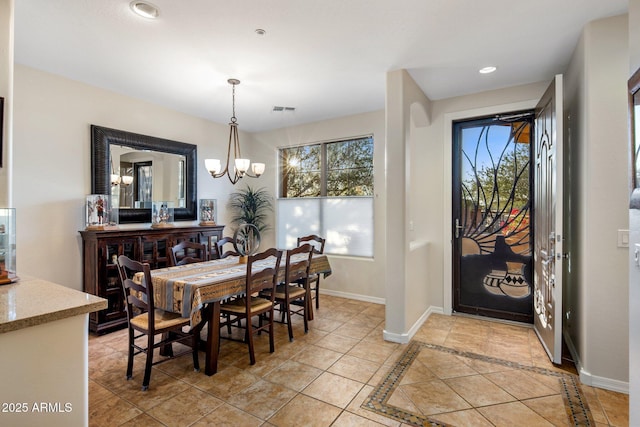 dining space featuring visible vents, recessed lighting, an inviting chandelier, light tile patterned floors, and baseboards