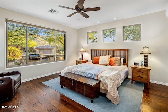 bedroom featuring visible vents, recessed lighting, wood-type flooring, baseboards, and ceiling fan