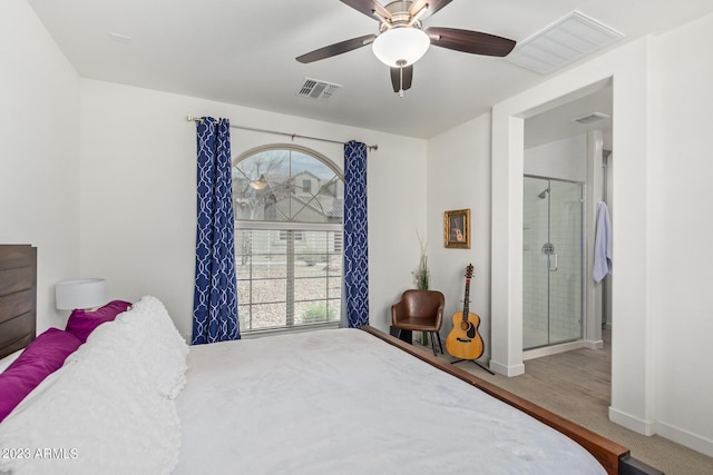 bedroom with ceiling fan and connected bathroom