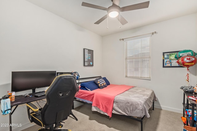 bedroom with light colored carpet and ceiling fan