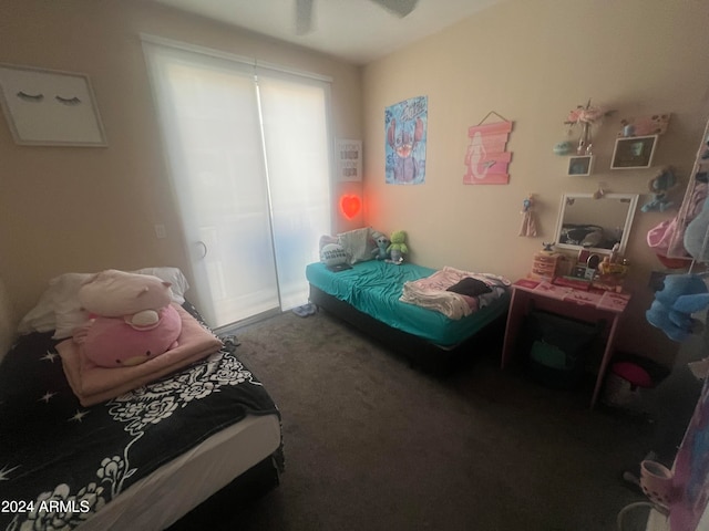 bedroom featuring ceiling fan and carpet floors