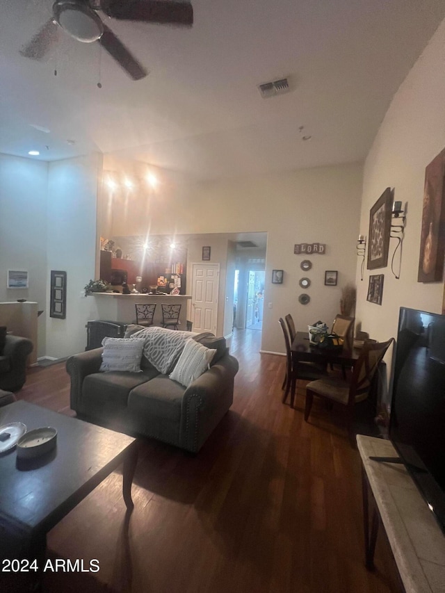 living room with ceiling fan and hardwood / wood-style floors