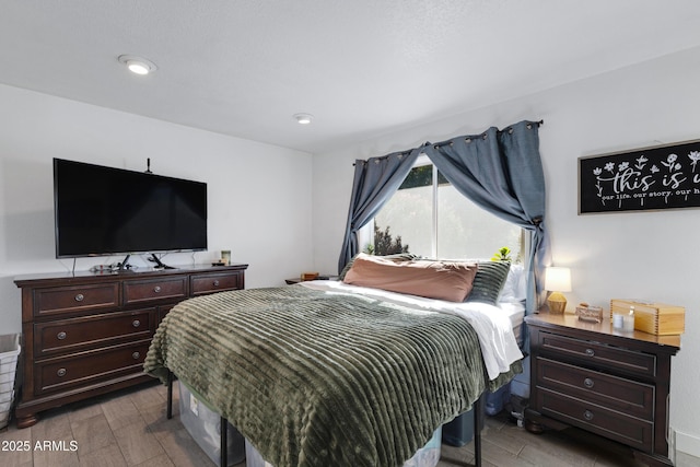 bedroom featuring light hardwood / wood-style floors