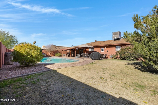 exterior space with a patio and a lawn