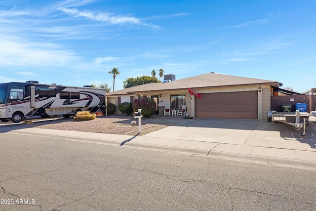 ranch-style home with a garage