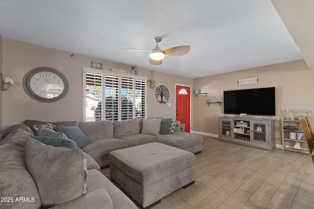 living room featuring ceiling fan