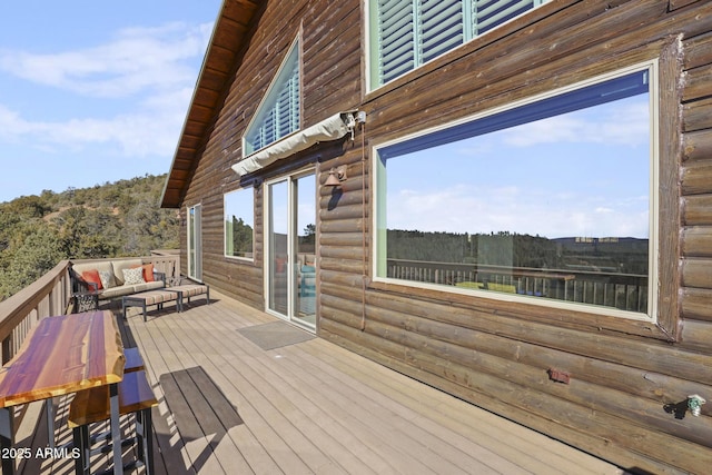 deck featuring an outdoor living space