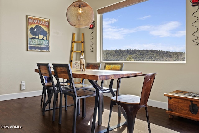 dining room featuring dark hardwood / wood-style floors