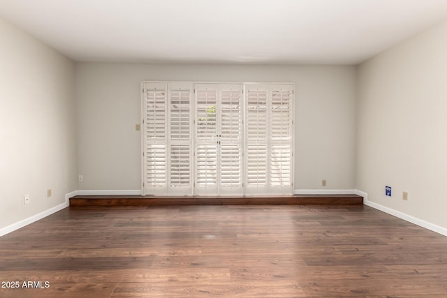 5208 S Deborah Dr, Tempe, AZ 85283 - unfurnished room featuring baseboards and wood finished floors