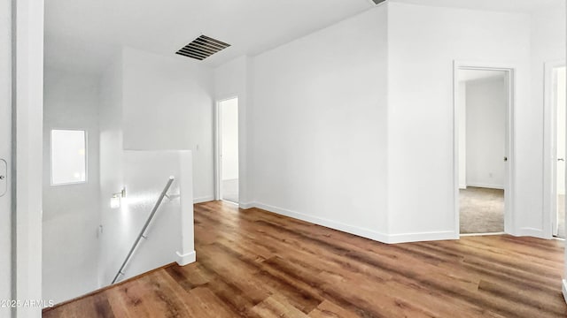 6537 W Pioneer St, Phoenix, AZ 85043 - hall featuring an upstairs landing and wood finished floors
