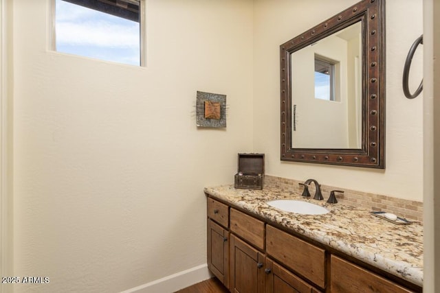 bathroom featuring vanity and wood-type flooring