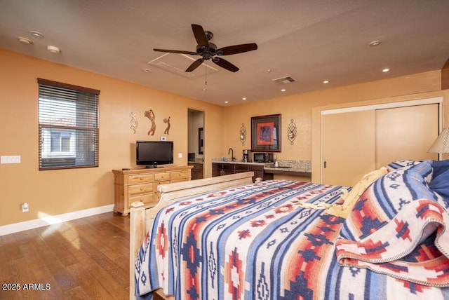 bedroom featuring hardwood / wood-style flooring