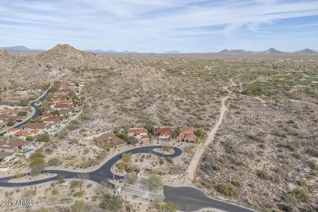 drone / aerial view featuring a mountain view