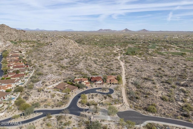 drone / aerial view featuring a mountain view