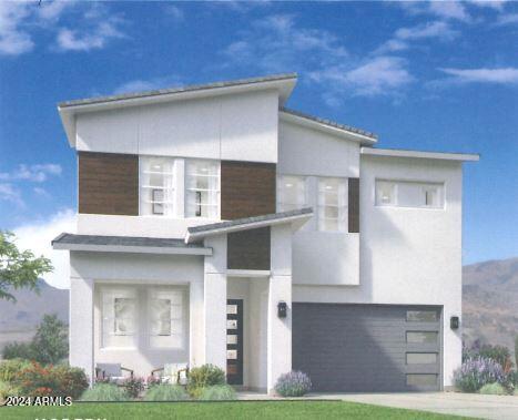 modern home featuring stucco siding, concrete driveway, and a garage