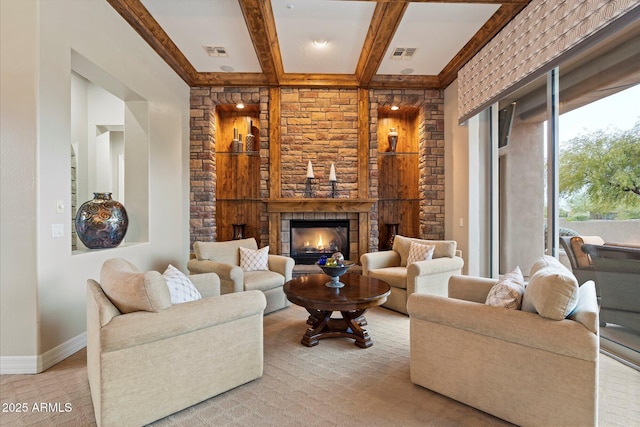 living room featuring coffered ceiling, beam ceiling, and a fireplace