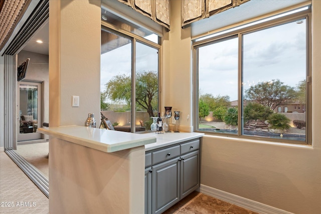 interior space featuring gray cabinetry