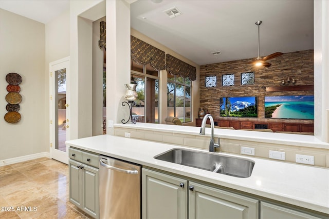 kitchen with sink and stainless steel dishwasher