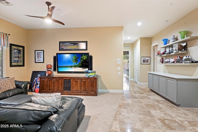 living room with ceiling fan