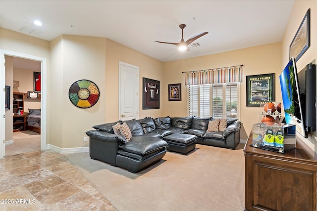 living room with light colored carpet and ceiling fan