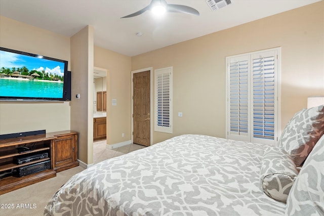 bedroom featuring ceiling fan and light carpet