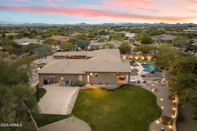 aerial view at dusk with a mountain view