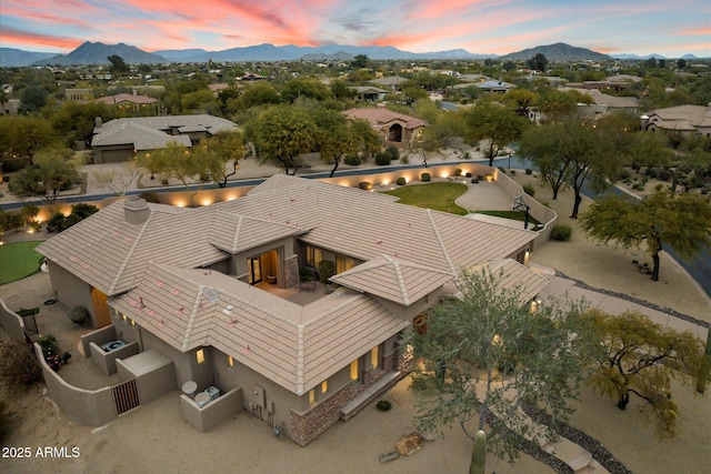 aerial view at dusk with a mountain view