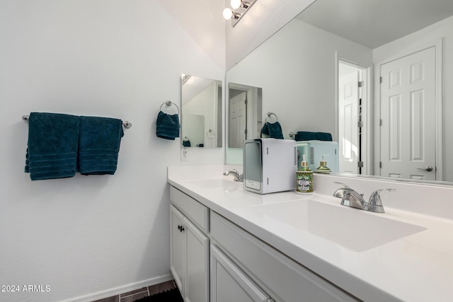 bathroom featuring hardwood / wood-style floors and vanity