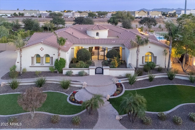 4547 S Banning Dr, Gilbert, AZ 85297 - view of front facade with stucco siding and a tiled roof