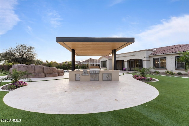 4547 S Banning Dr, Gilbert, AZ 85297 - view of patio / terrace featuring area for grilling and an outdoor kitchen