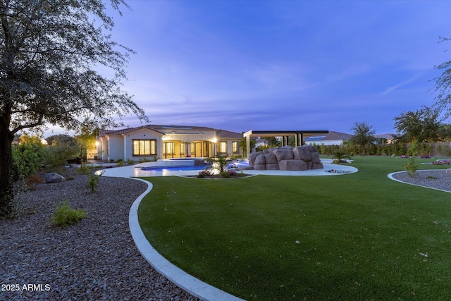 4547 S Banning Dr, Gilbert, AZ 85297 - back of property featuring an outdoor pool, a patio, and a yard