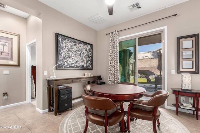 dining area with light tile patterned floors and ceiling fan