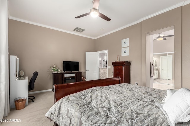 bedroom with ornamental molding, light colored carpet, ceiling fan, and ensuite bath