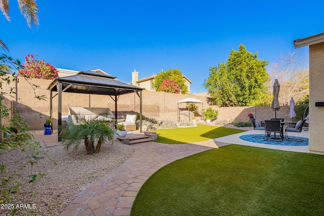 view of yard with a gazebo and a patio